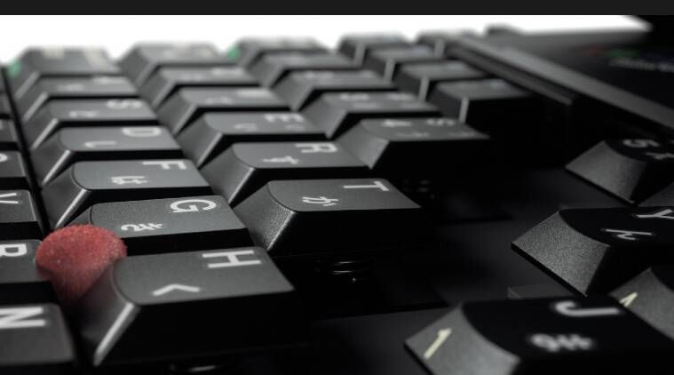 IBM ThinkPad 701C, clavier papillon IBM ThinkPad 701C, historique IBM ThinkPad 701C, John Karidis IBM, Lenovo, Lenovo ThinkPad, Dilip Bhatia Lenovo